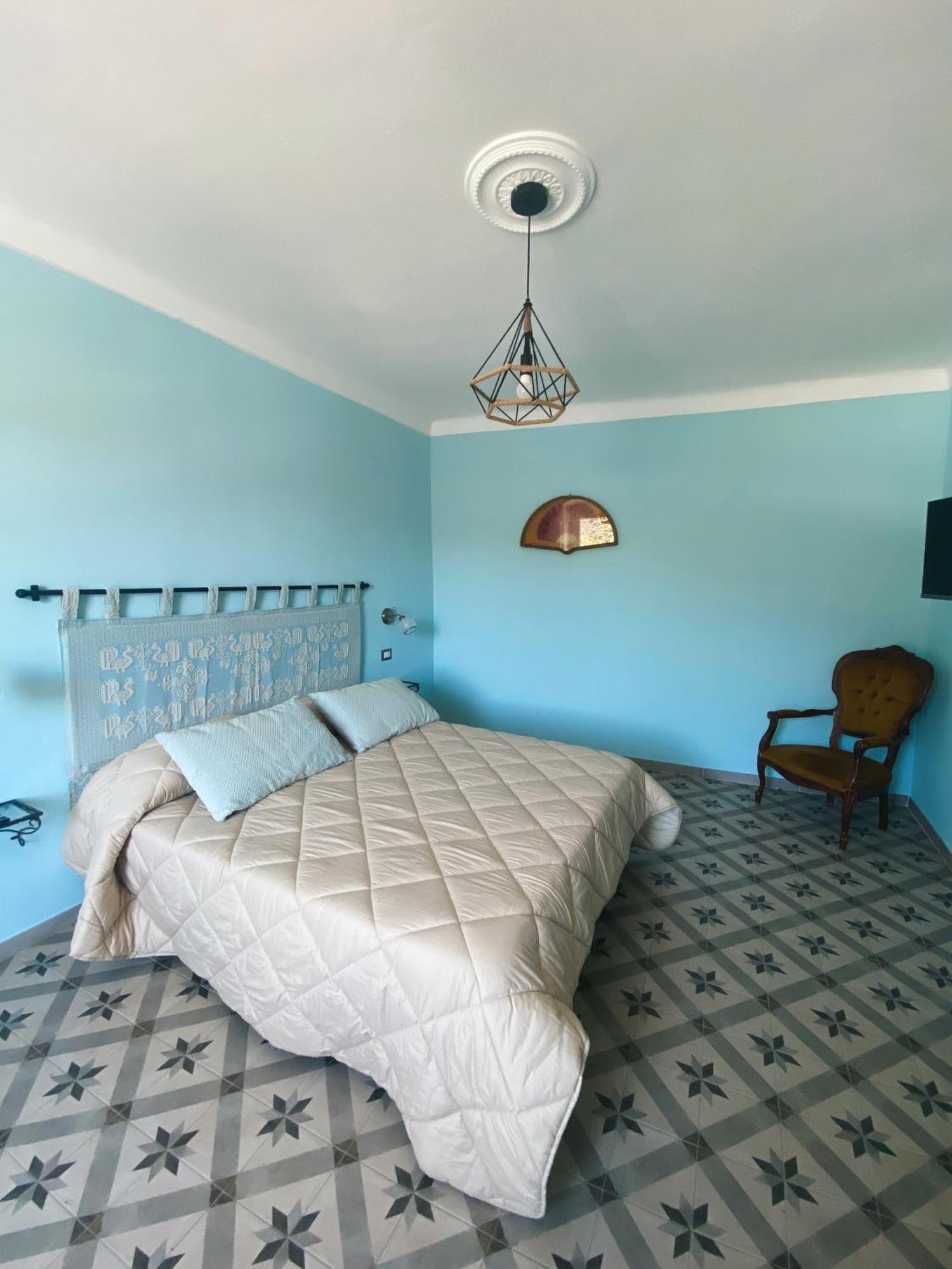 Tra I Due Ponti Hotel Боза Екстериор снимка