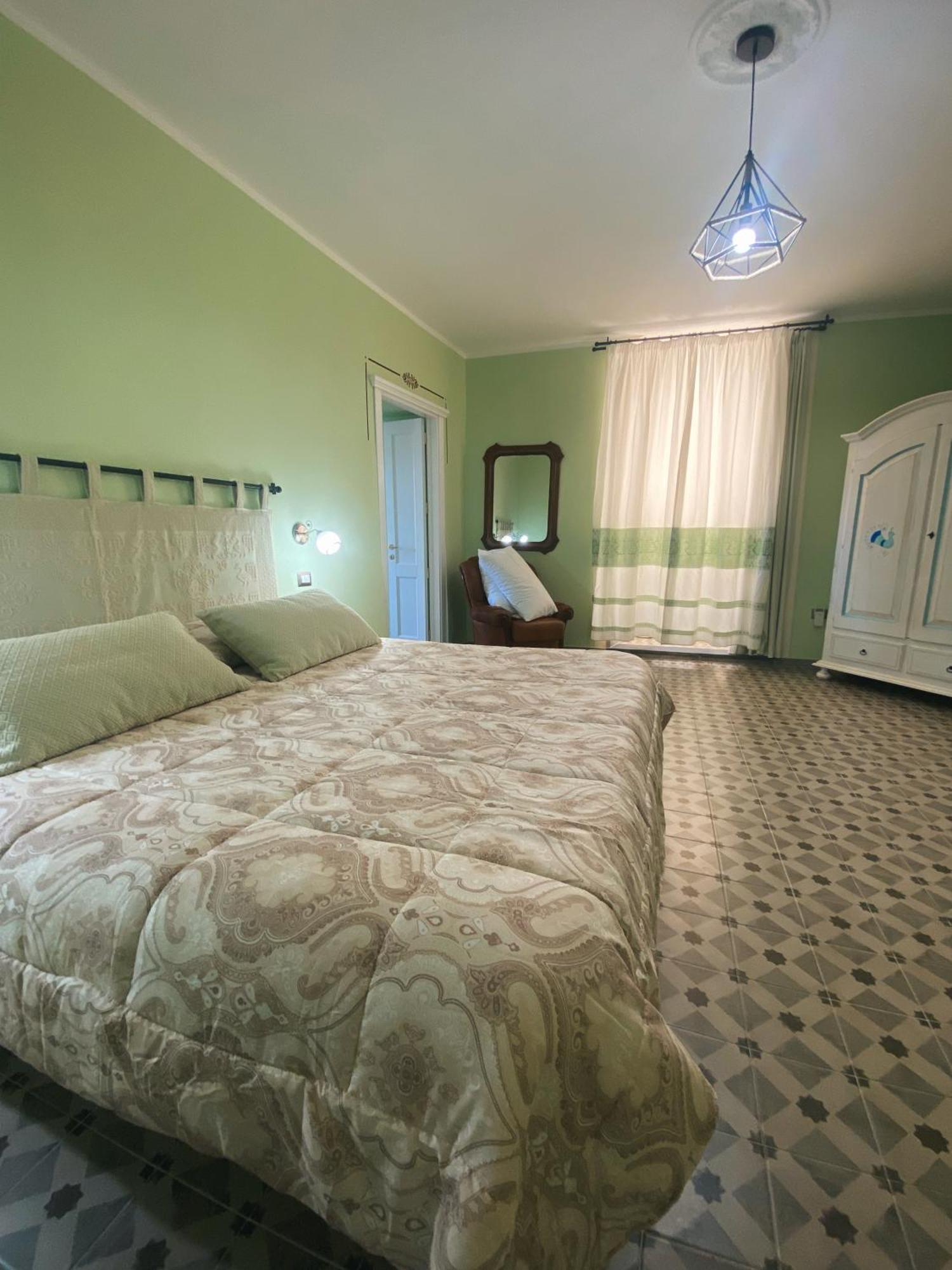 Tra I Due Ponti Hotel Боза Екстериор снимка