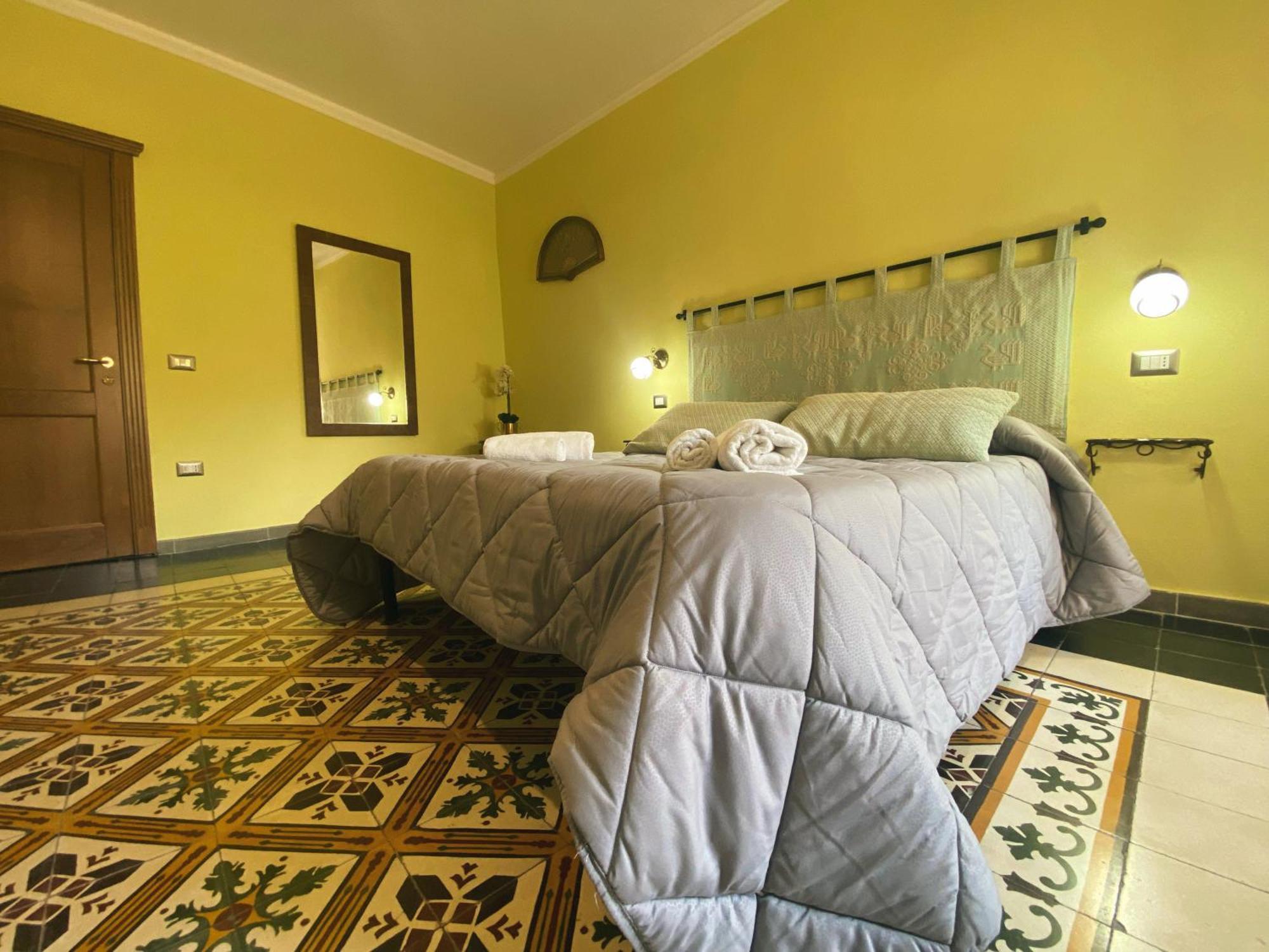 Tra I Due Ponti Hotel Боза Екстериор снимка