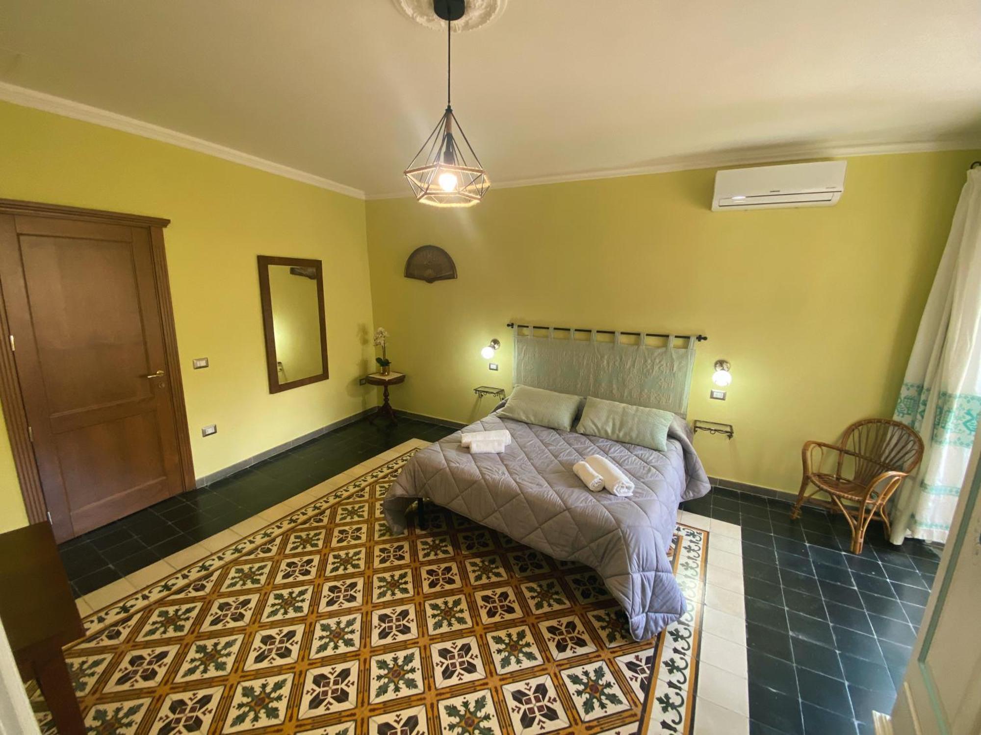 Tra I Due Ponti Hotel Боза Екстериор снимка
